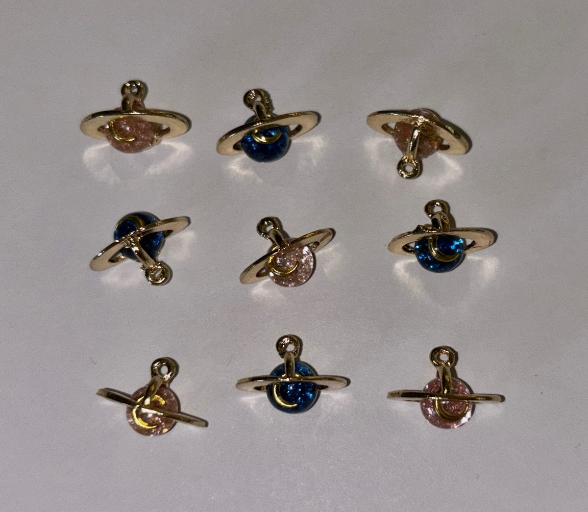 Charms planetas.