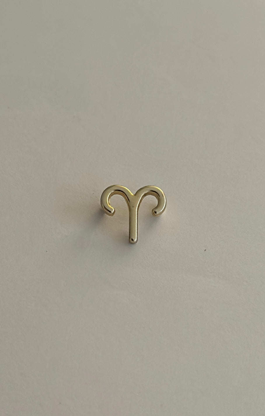 Charms signos zodiacales dorado.