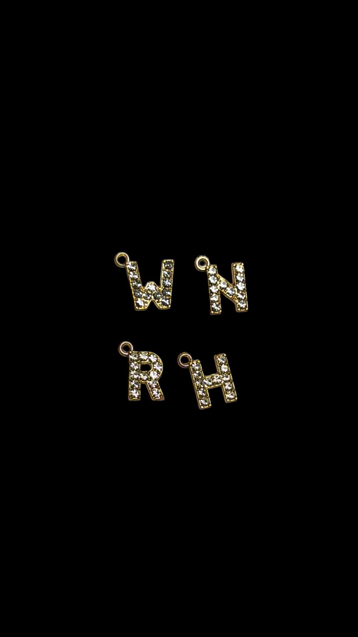 Charms letra brillosa.
